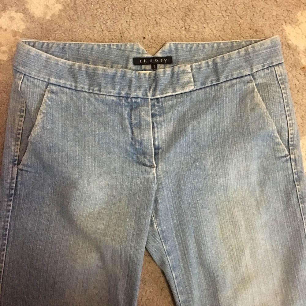 {Theory} flared, light-washed jeans